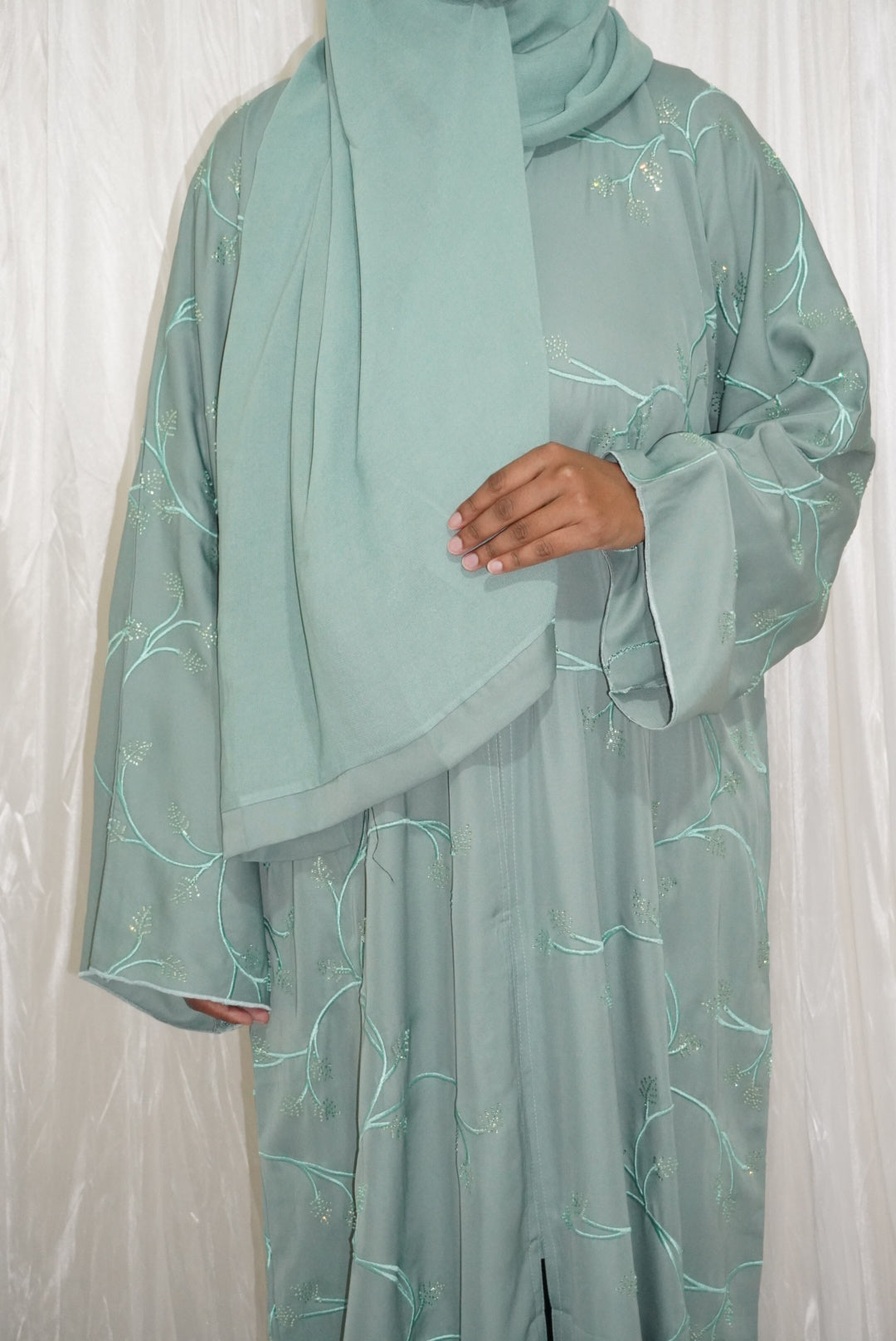 Fatiisa Abaya with buttons, full front and back embroidery, beaded work, and a scarf.
