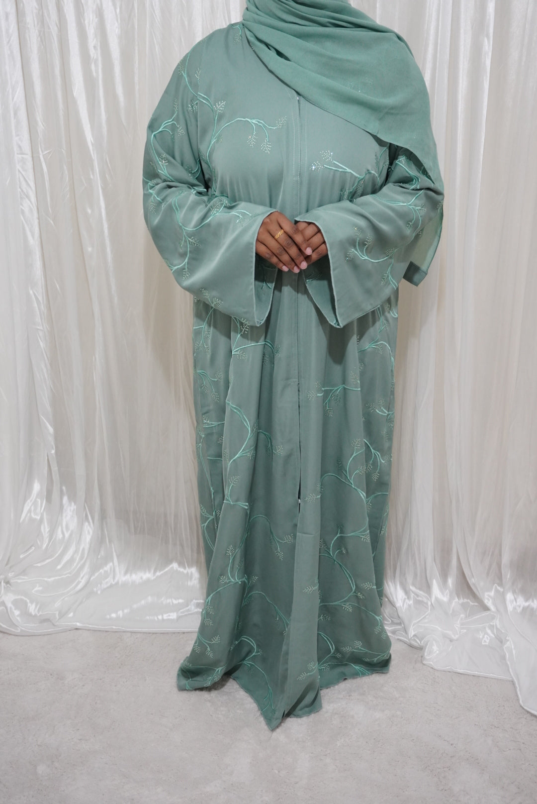 Fatiisa Abaya with buttons, full front and back embroidery, beaded work, and a scarf.